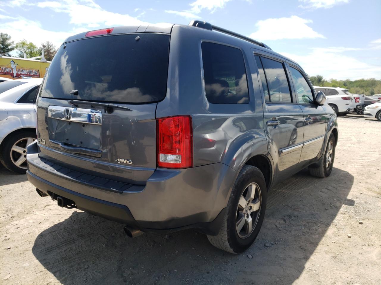 Photo 4 from auction – 2011 HONDA PILOT EXL with VIN 5FNYF4H62BB043891