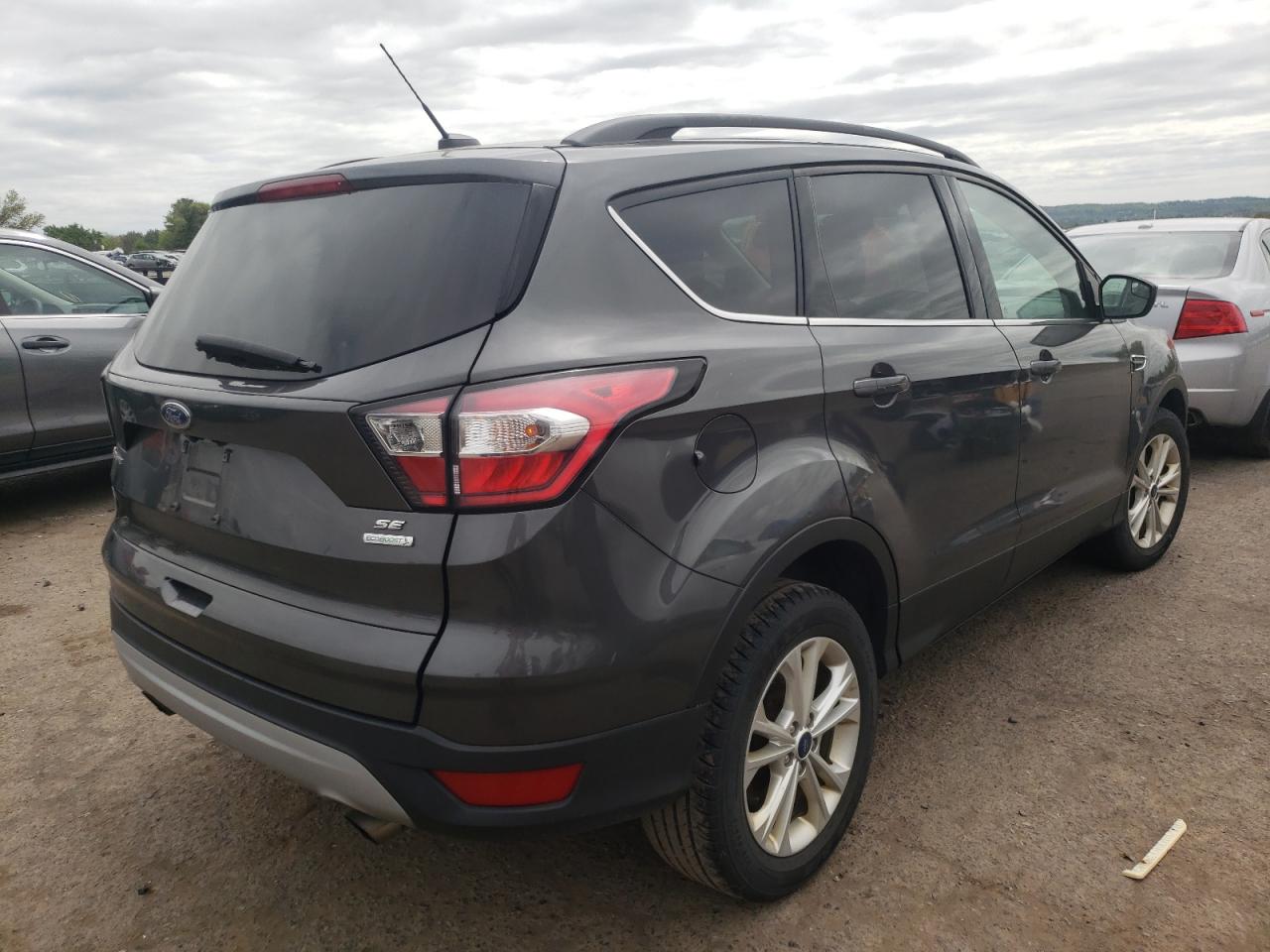 Photo 4 from auction – 2018 FORD ESCAPE SE with VIN 1FMCU0GDXJUA74249