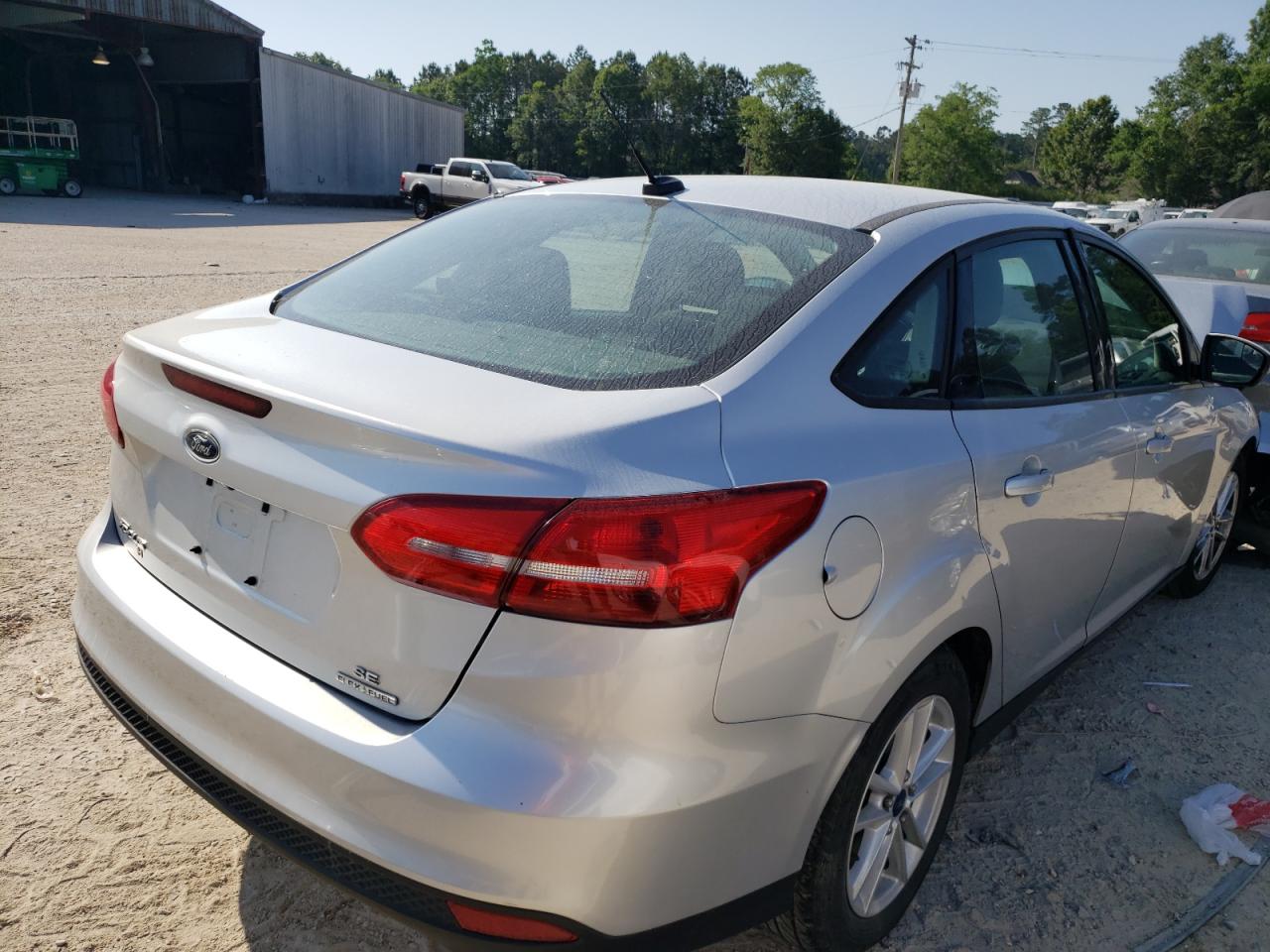 Photo 4 from auction – 2015 FORD FOCUS SE with VIN 1FADP3F28FL354210