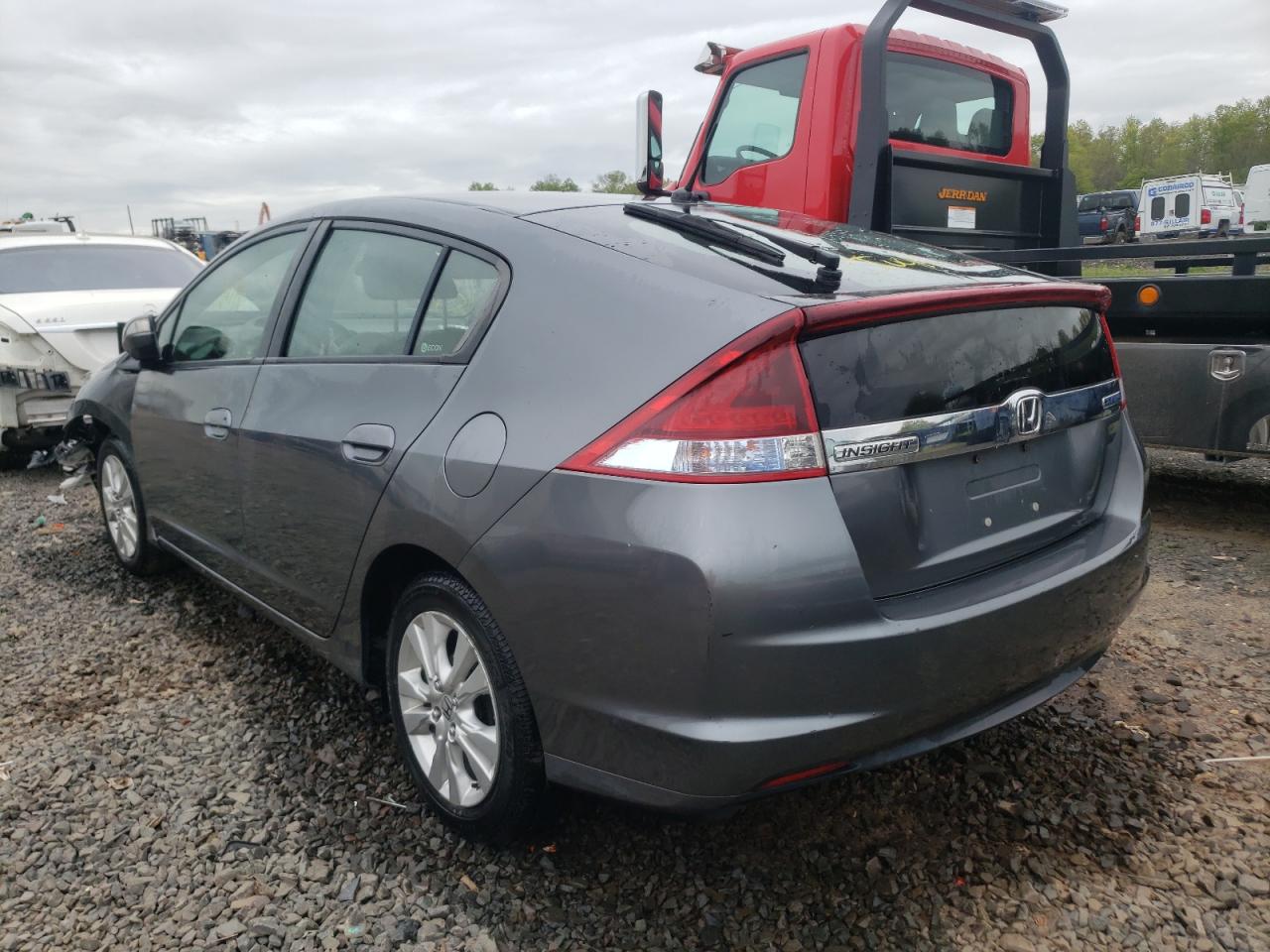 Photo 3 from auction – 2012 HONDA INSIGHT EX with VIN JHMZE2H7XCS003811