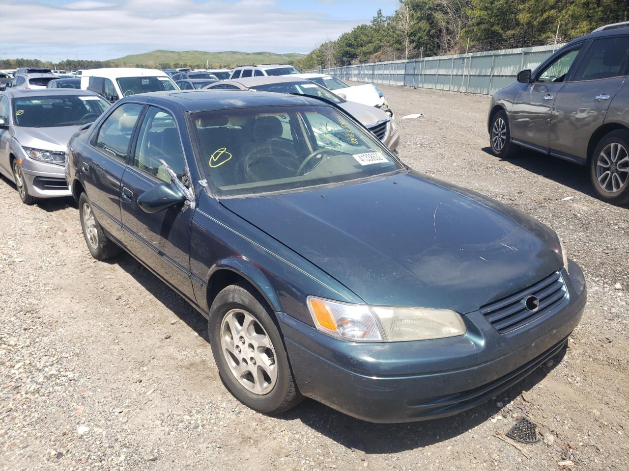 TOYOTA CAMRY CE 1997 with VIN 4T1BF22K5VU016854 - Photo from auction