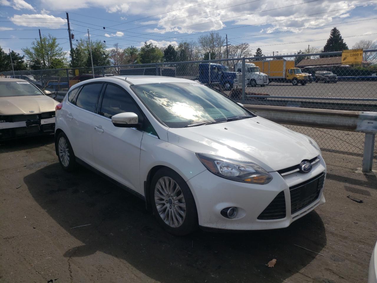 FORD FOCUS TITA 2012 with VIN 1FAHP3N28CL227410 - Photo from auction