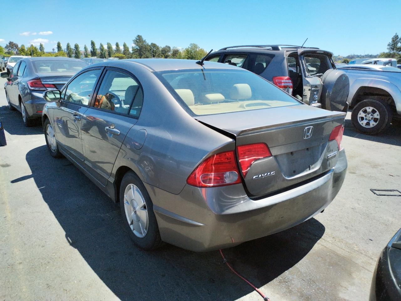 Photo 3 from auction – 2006 HONDA CIVIC HYBR with VIN JHMFA36256S021424
