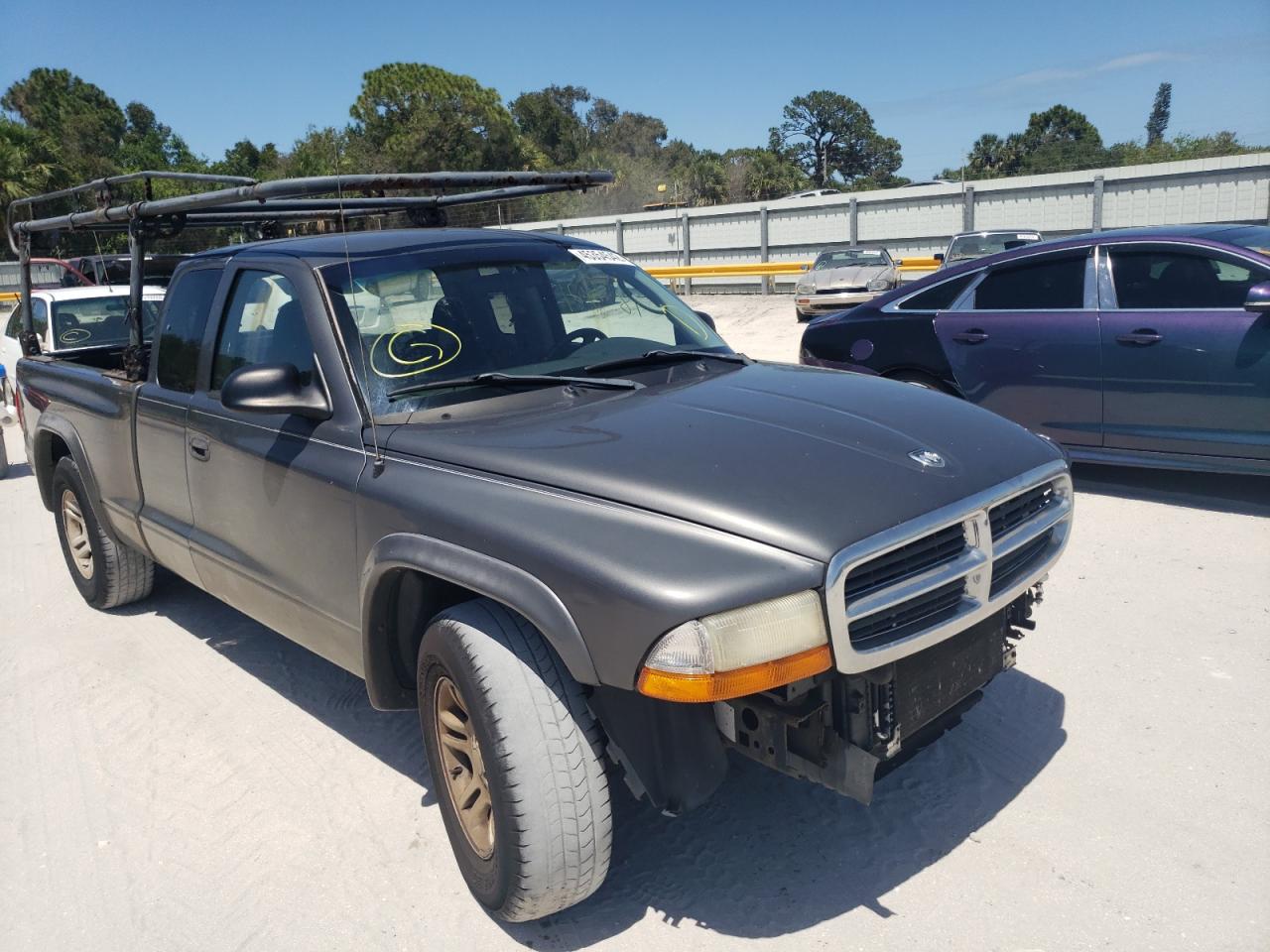 DODGE DAKOTA SXT 2004 with VIN 1D7GL12K54S519040 - Photo from auction
