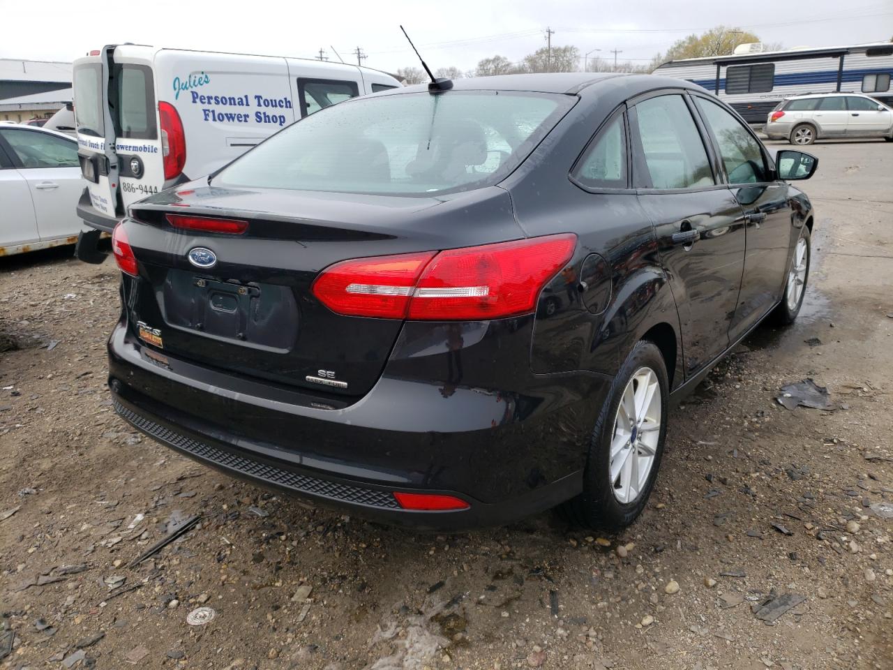 Photo 4 from auction – 2015 FORD FOCUS SE with VIN 1FADP3F21FL247502