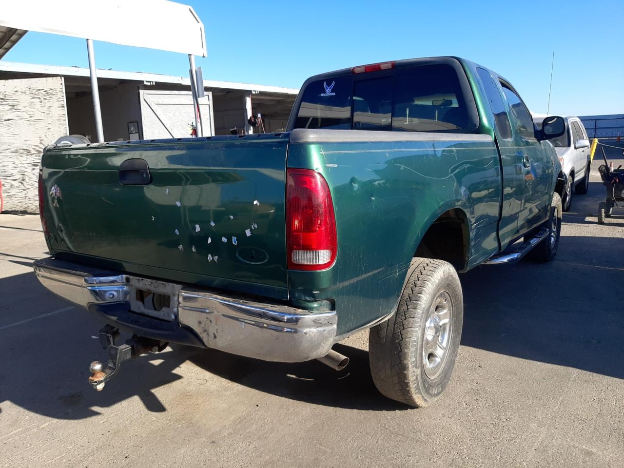 Photo 4 from auction – 1999 FORD F150 with VIN 1FTRX18L6XKB73401