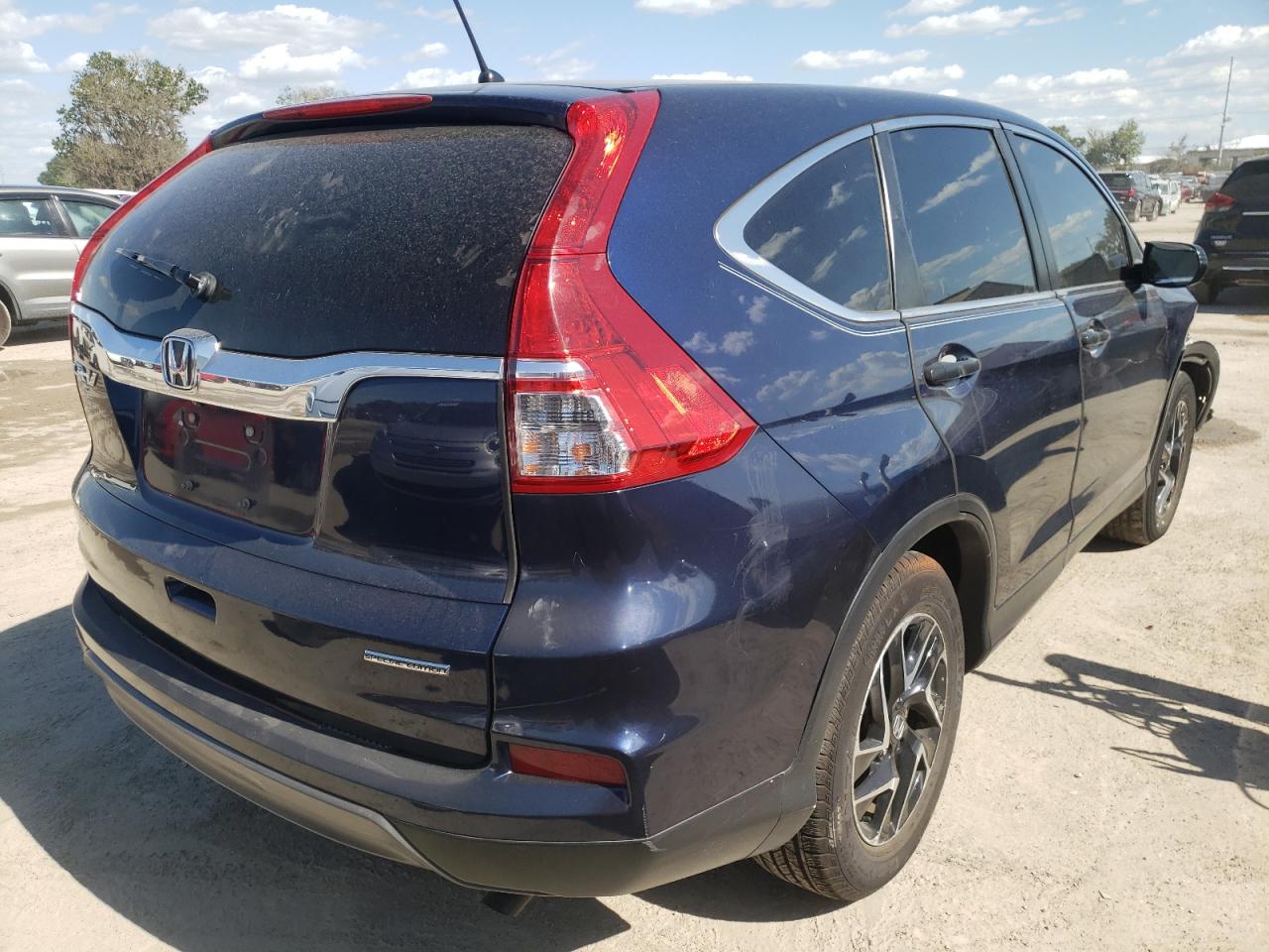 Photo 4 from auction – 2016 HONDA CR-V SE with VIN 2HKRM3H47GH513277
