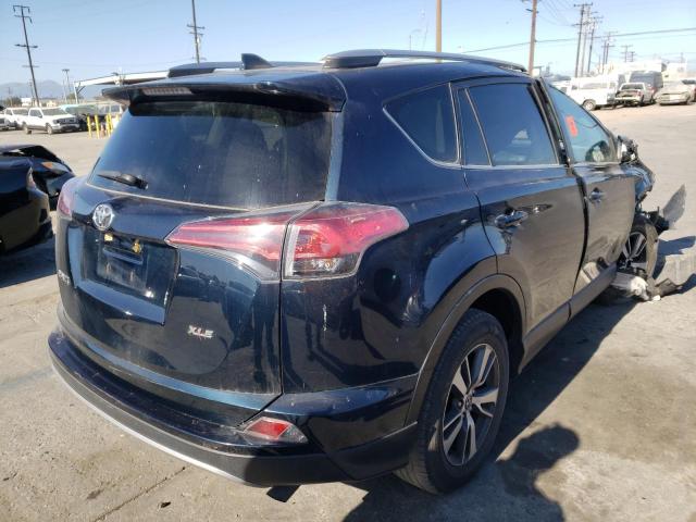 Photo 4 from auction – 2017 TOYOTA RAV4 XLE with VIN JTMWFREV0HJ108576