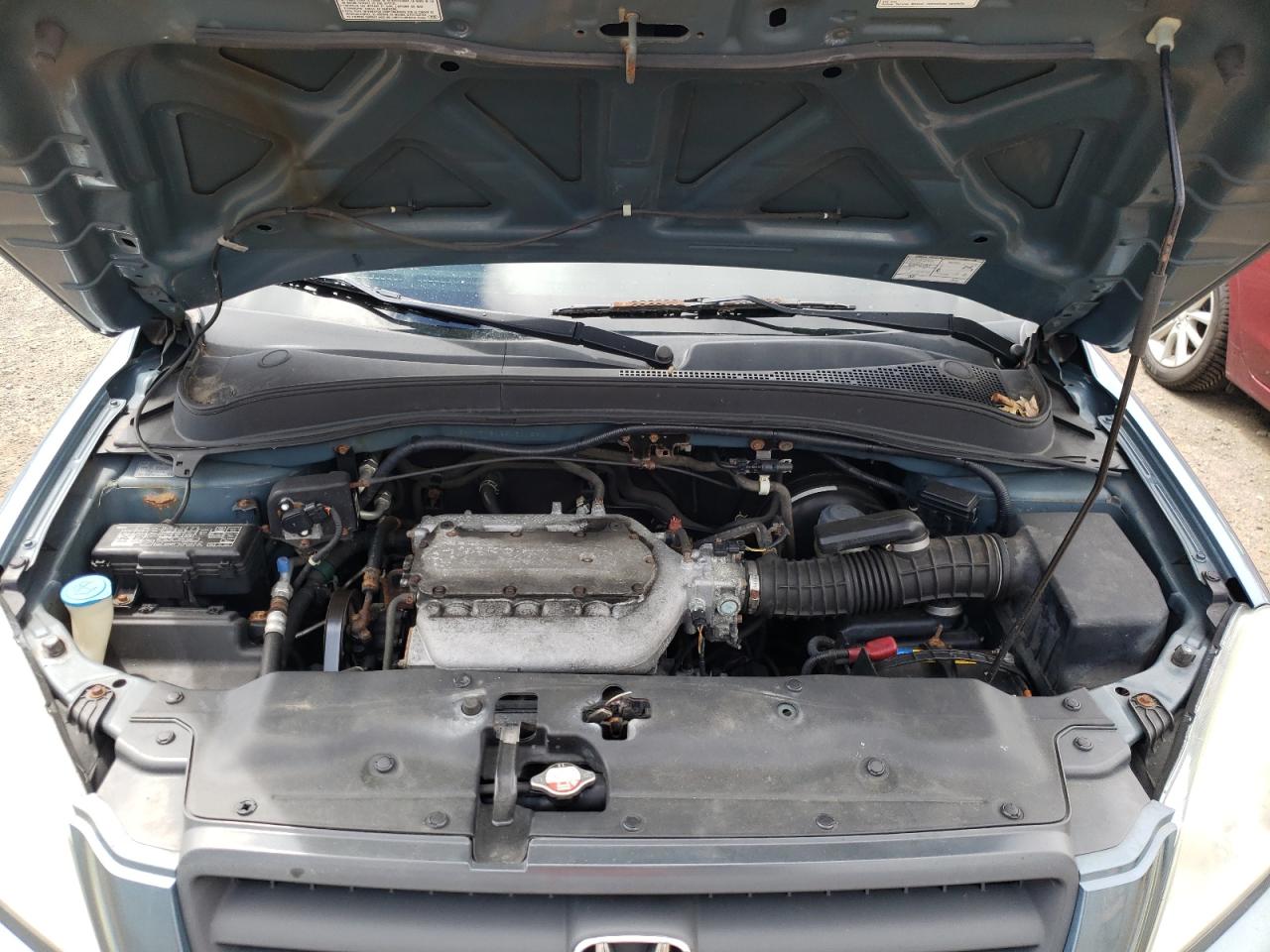Photo 7 from auction – 2005 HONDA PILOT LX with VIN 2HKYF18125H501860