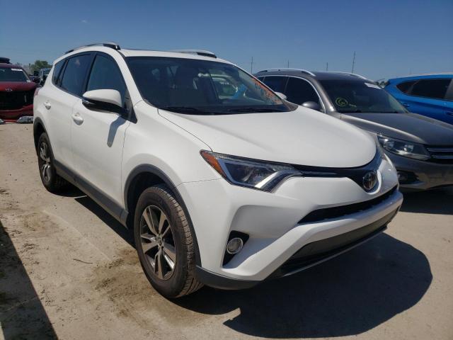 Photo 1 from auction – 2017 TOYOTA RAV4 XLE with VIN JTMWFREV5HJ704833