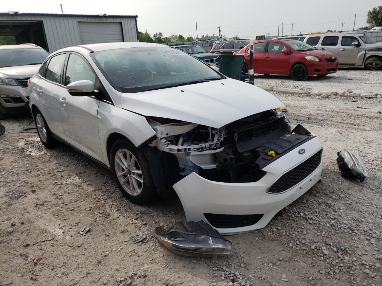 FORD FOCUS SE 2015 with VIN 1FADP3F2XFL376032 - Photo from auction