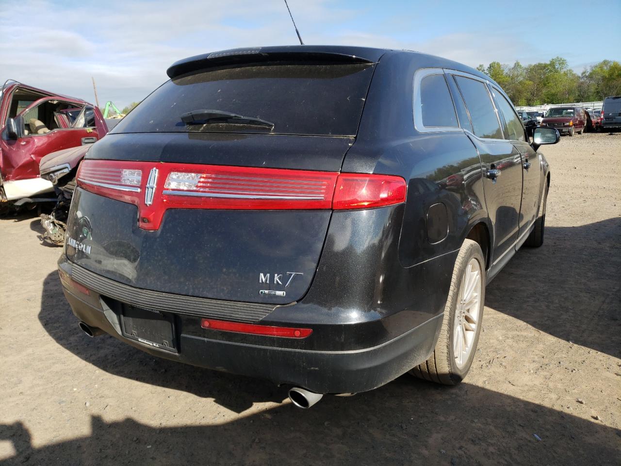 Photo 4 from auction – 2014 LINCOLN MKT with VIN 2LMHJ5ATXEBL57908