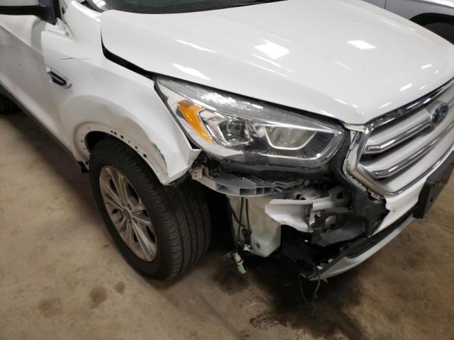 Photo 9 from auction – 2017 FORD ESCAPE SE with VIN 1FMCU9GD4HUD93645