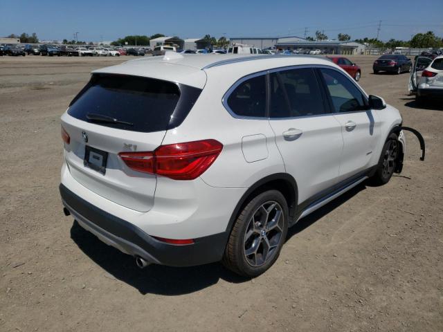 Photo 4 from auction – 2018 BMW X1 XDRIVE2 with VIN WBXHT3C36J5F90619