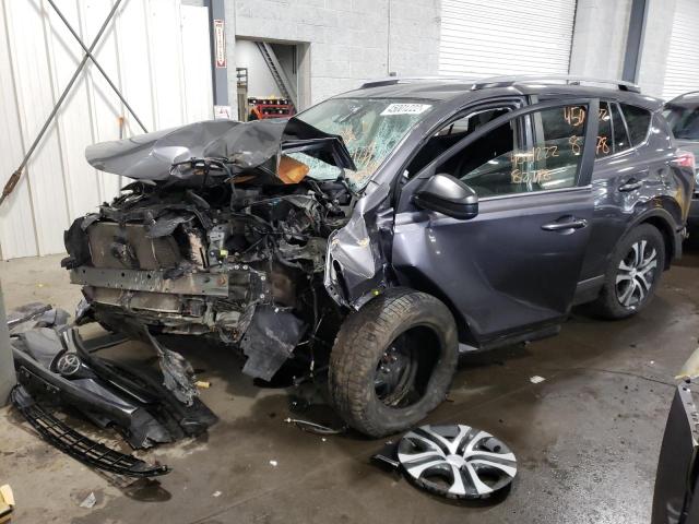 Photo 2 from auction – 2018 TOYOTA RAV4 LE with VIN JTMBFREV6JJ718406