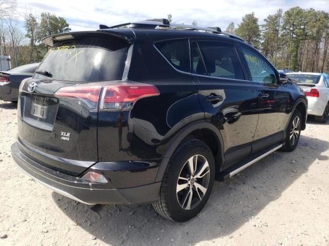 Photo 4 from auction – 2016 TOYOTA RAV4 XLE with VIN 2T3RFREV2GW427023