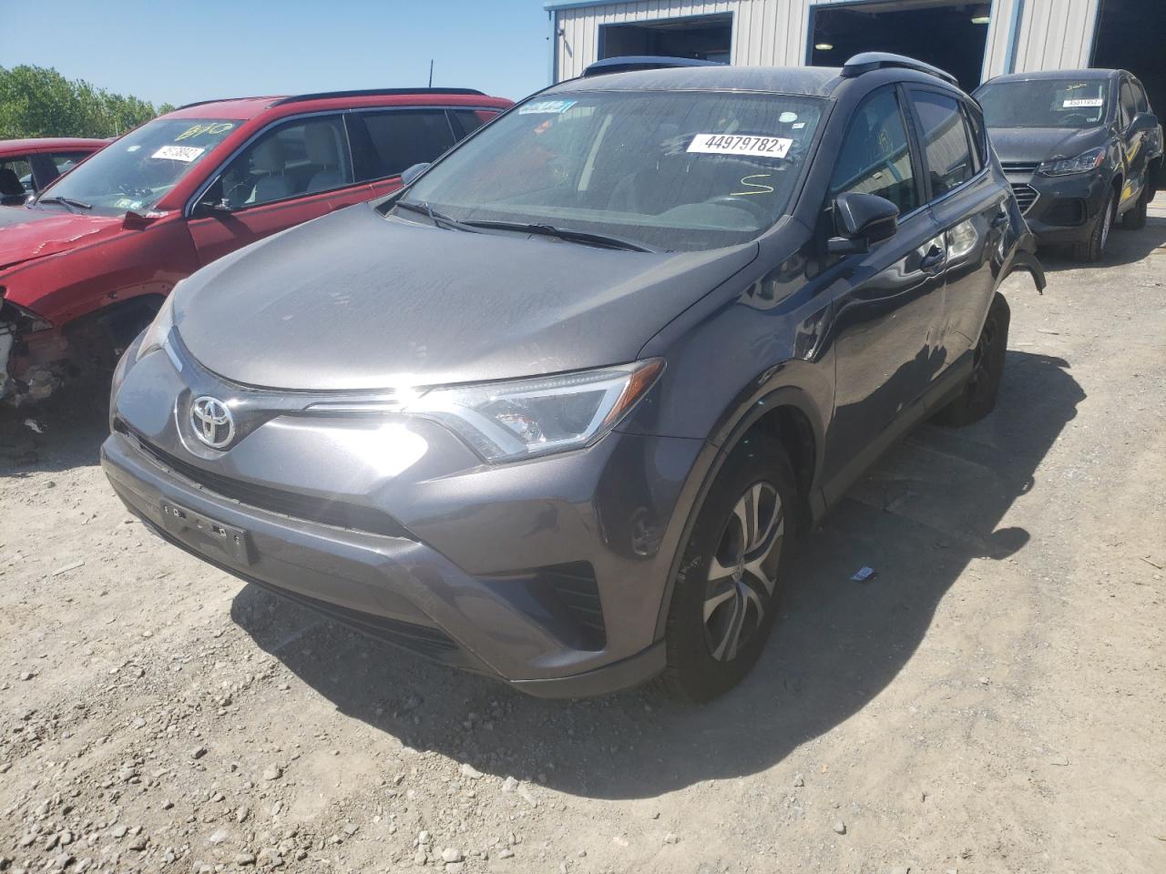 Photo 2 from auction – 2016 TOYOTA RAV4 LE with VIN JTMZFREV5GJ060441