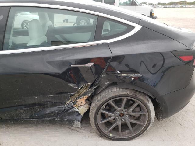 Photo 9 from auction – 2019 TESLA MODEL 3 with VIN 5YJ3E1EA8KF431325