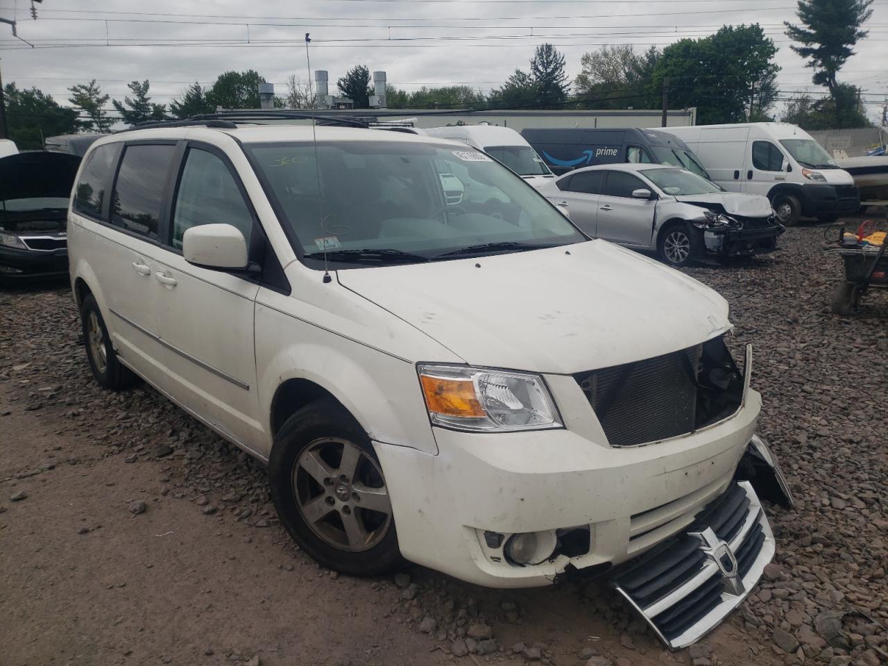 DODGE GRAND CARA 2010 with VIN 2D4RN5D11AR390383 - Photo from auction