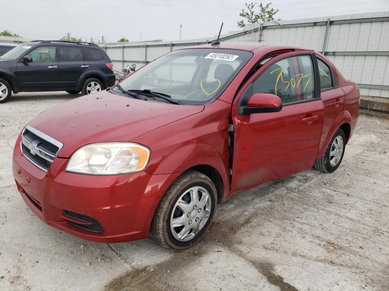 Photo 9 from auction – 2011 CHEVROLET AVEO LS with VIN KL1TD5DE2BB220582