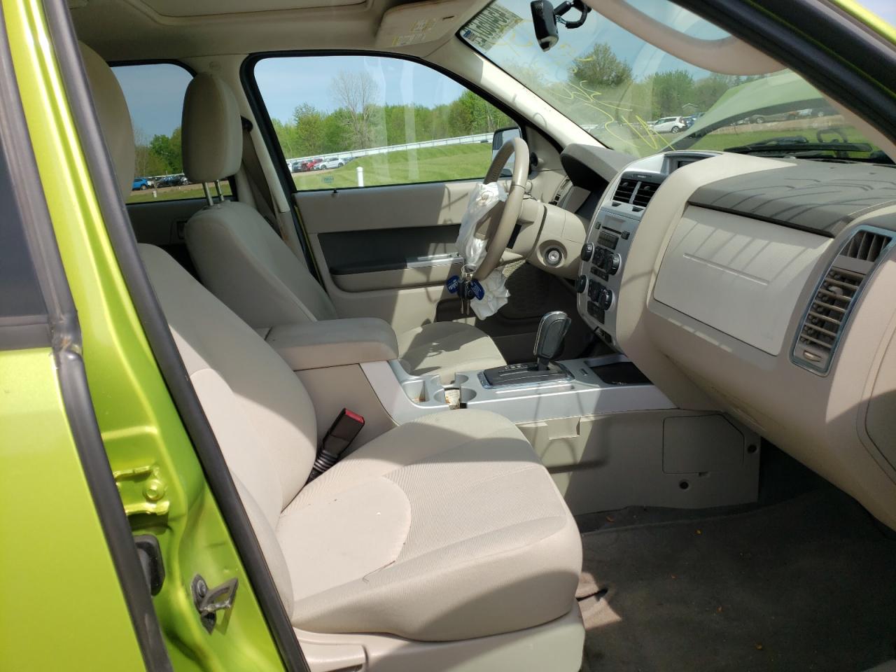 Photo 15 from auction – 2011 MERCURY MARINER with VIN 4M2CN8B74BKJ01602