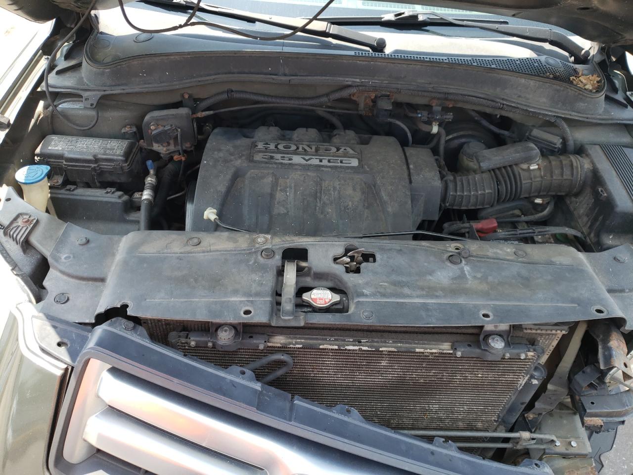 Photo 7 from auction – 2006 HONDA PILOT LX with VIN 5FNYF18156B005712