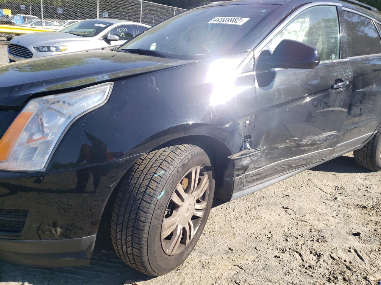 Photo 9 from auction – 2013 CADILLAC SRX with VIN 3GYFNAE33DS637302