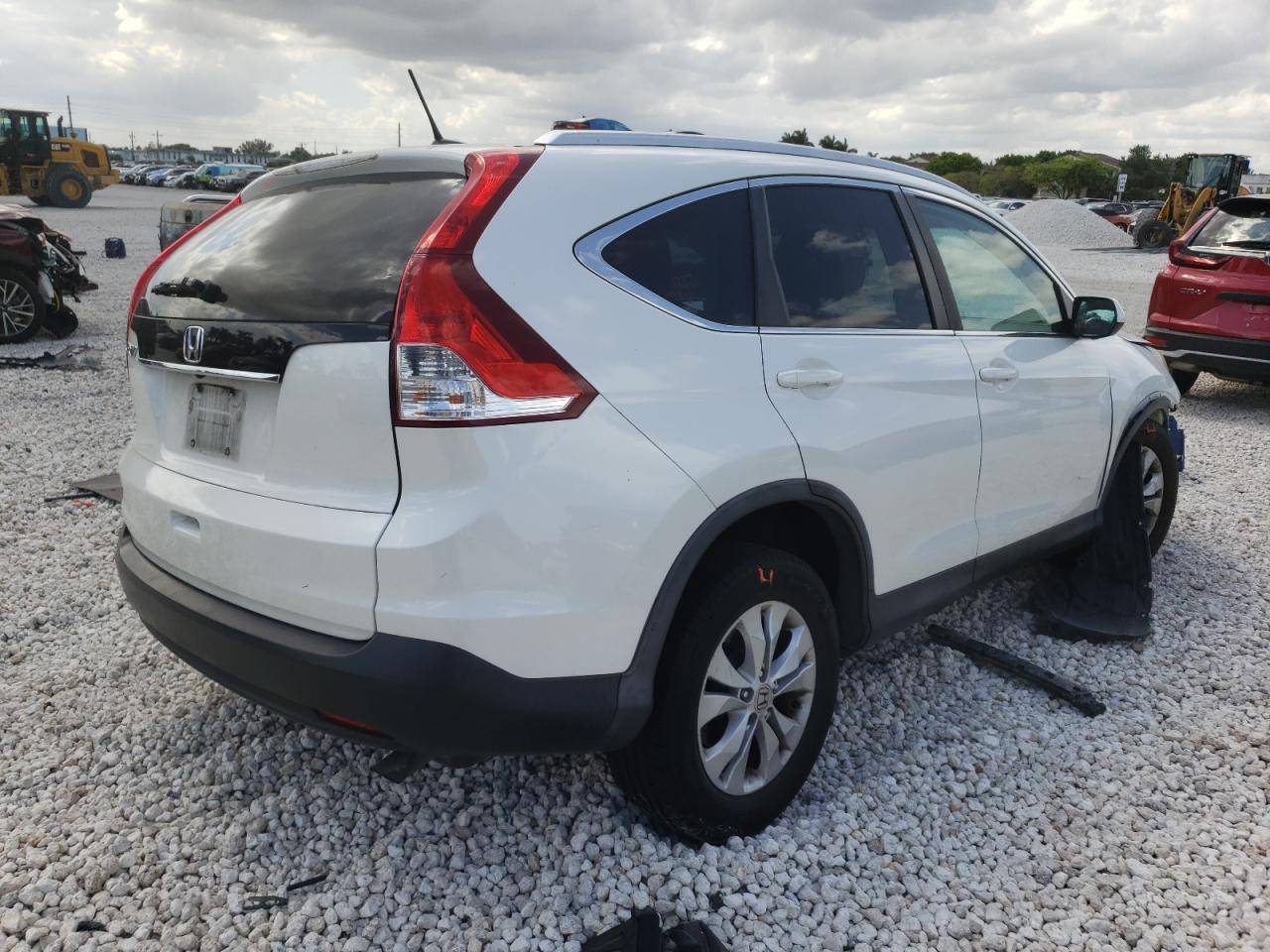 Photo 4 from auction – 2014 HONDA CR-V EXL with VIN 5J6RM3H74EL009590