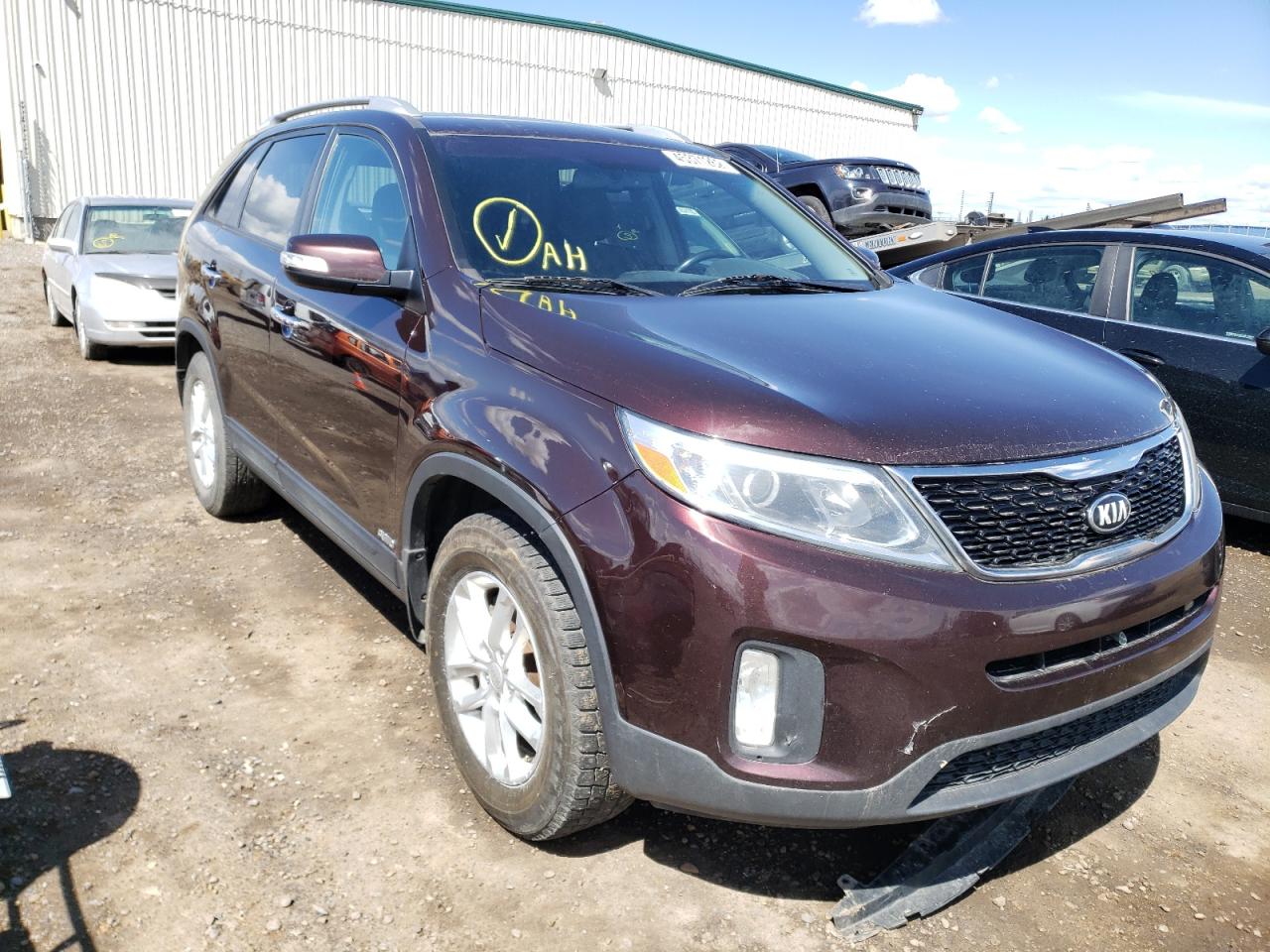 KIA SORENTO LX 2015 with VIN 5XYKTDA72FG657159 - Photo from auction