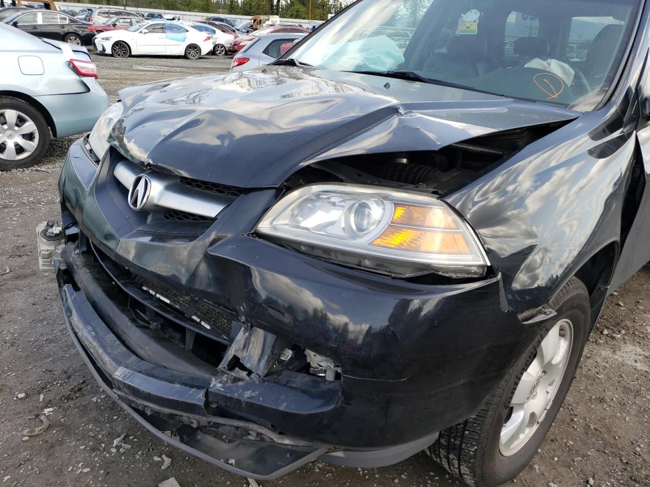 Photo 9 from auction – 2005 ACURA MDX with VIN 2HNYD18235H519026