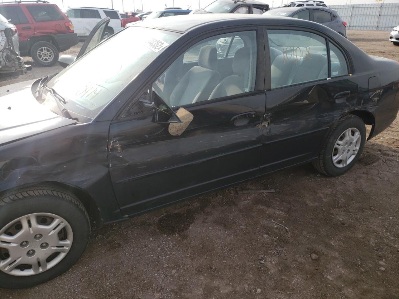 Photo 20 from auction – 2002 HONDA CIVIC LX with VIN 1HGES15642L080974