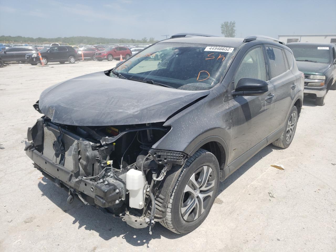 Photo 2 from auction – 2017 TOYOTA RAV4 LE with VIN JTMBFREV7HJ120352