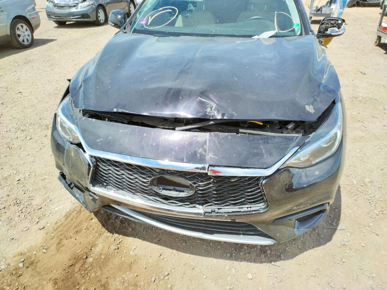 Photo 9 from auction – 2018 INFINITI QX30 BASE with VIN SJKCH5CP9JA059472