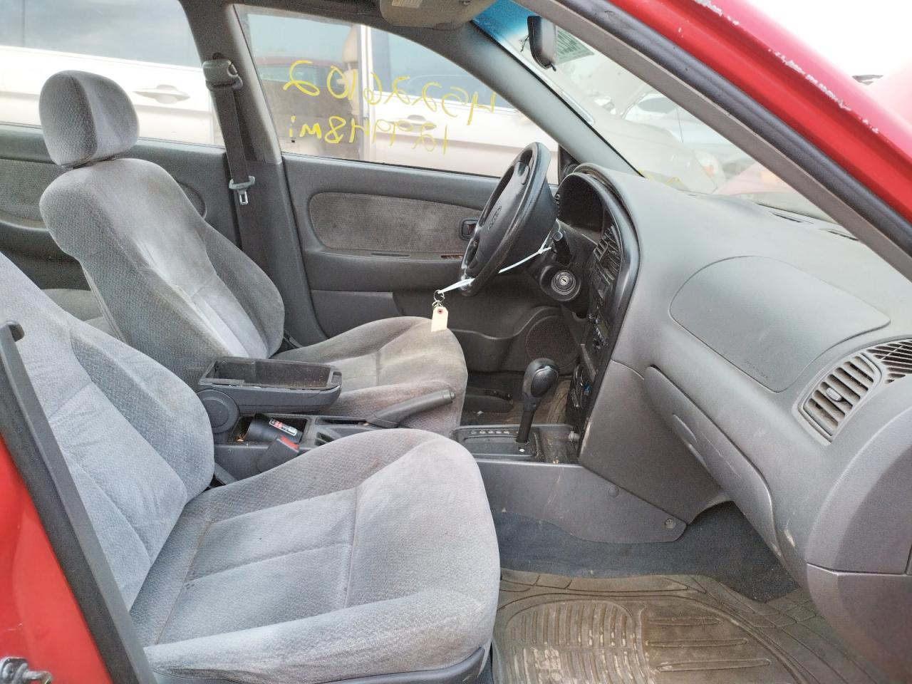 Photo 5 from auction – 2002 KIA SPECTRA BA with VIN KNAFB121825123709
