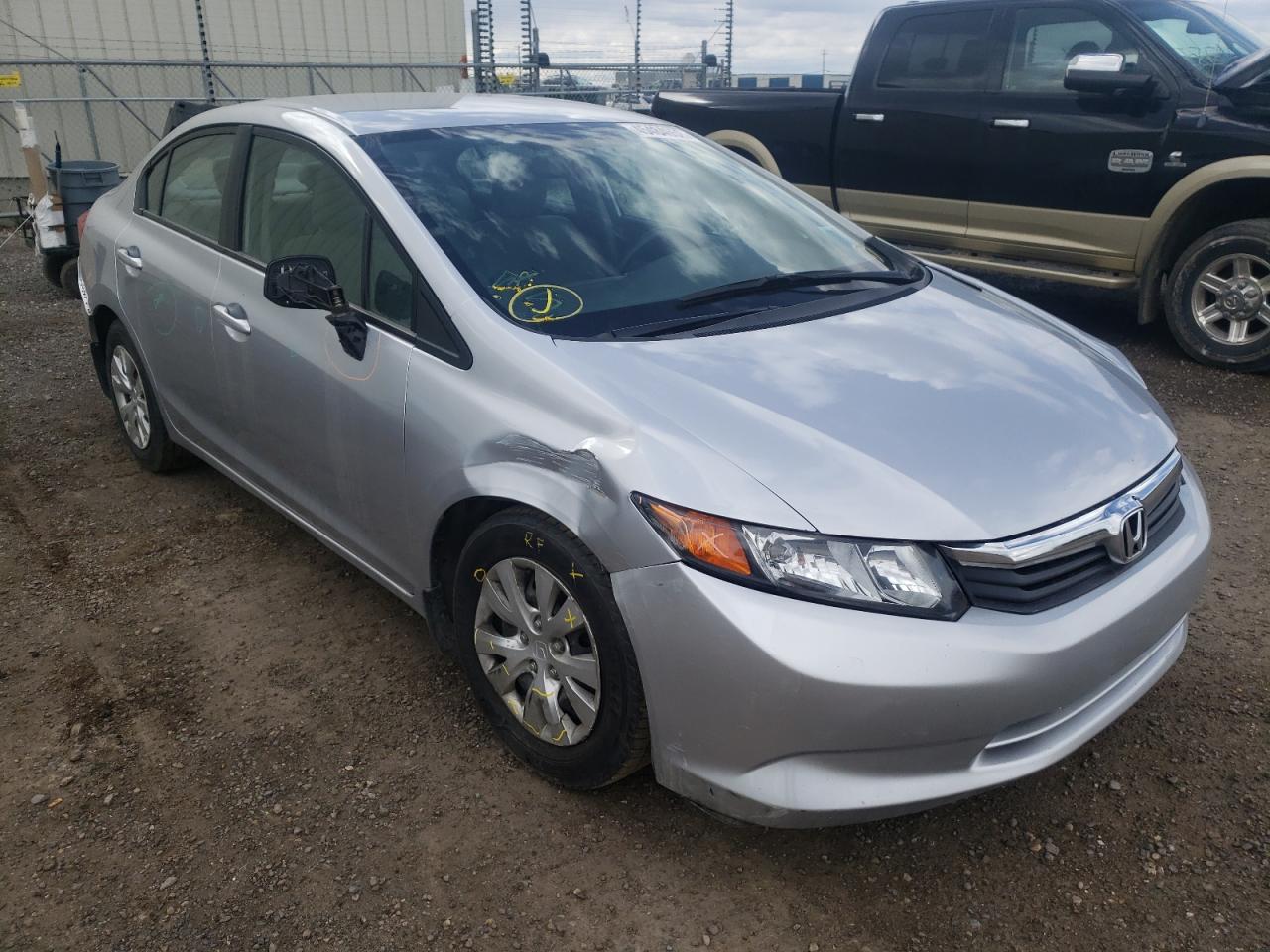 HONDA CIVIC LX 2012 with VIN 2HGFB2F44CH062643 - Photo from auction