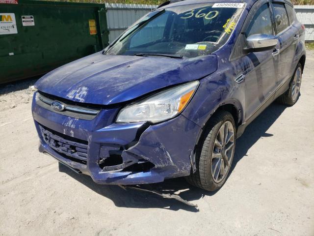 Photo 9 from auction – 2015 FORD ESCAPE SE with VIN 1FMCU9G90FUB62685