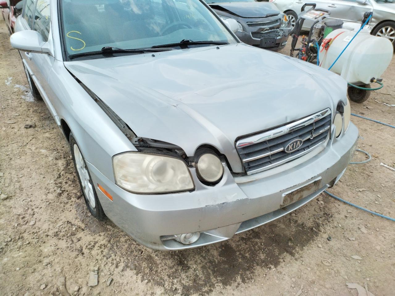 Photo 9 from auction – 2005 KIA OPTIMA LX with VIN KNAGD126655378180