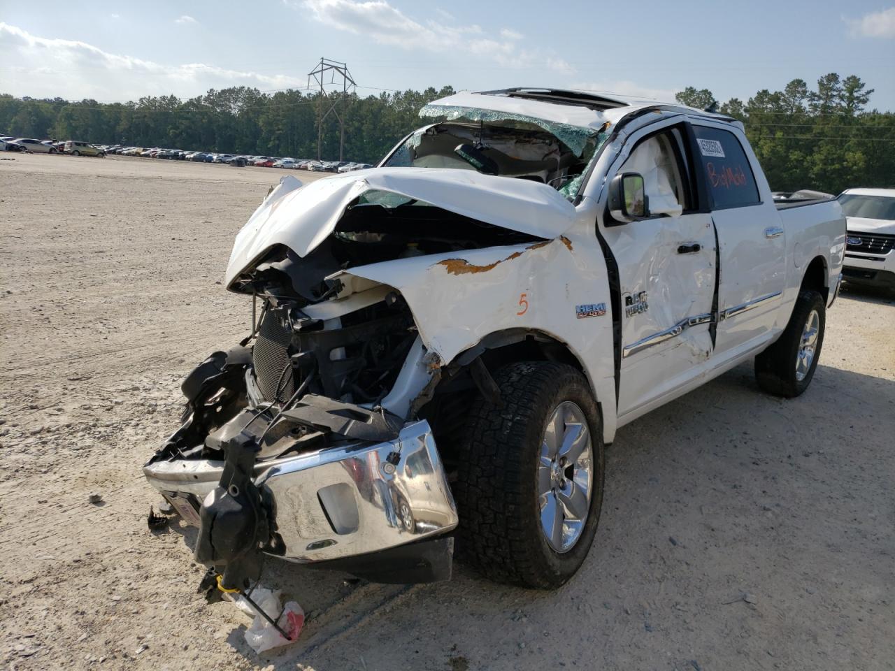 Photo 2 from auction – 2014 RAM 1500 SLT with VIN 1C6RR7LT5ES426832