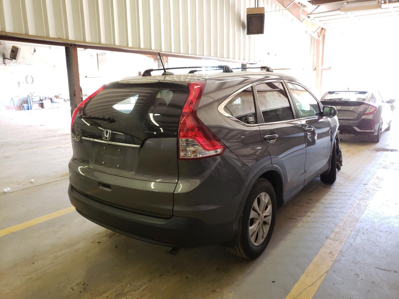 Photo 4 from auction – 2013 HONDA CR-V EXL with VIN 2HKRM3H7XDH516891