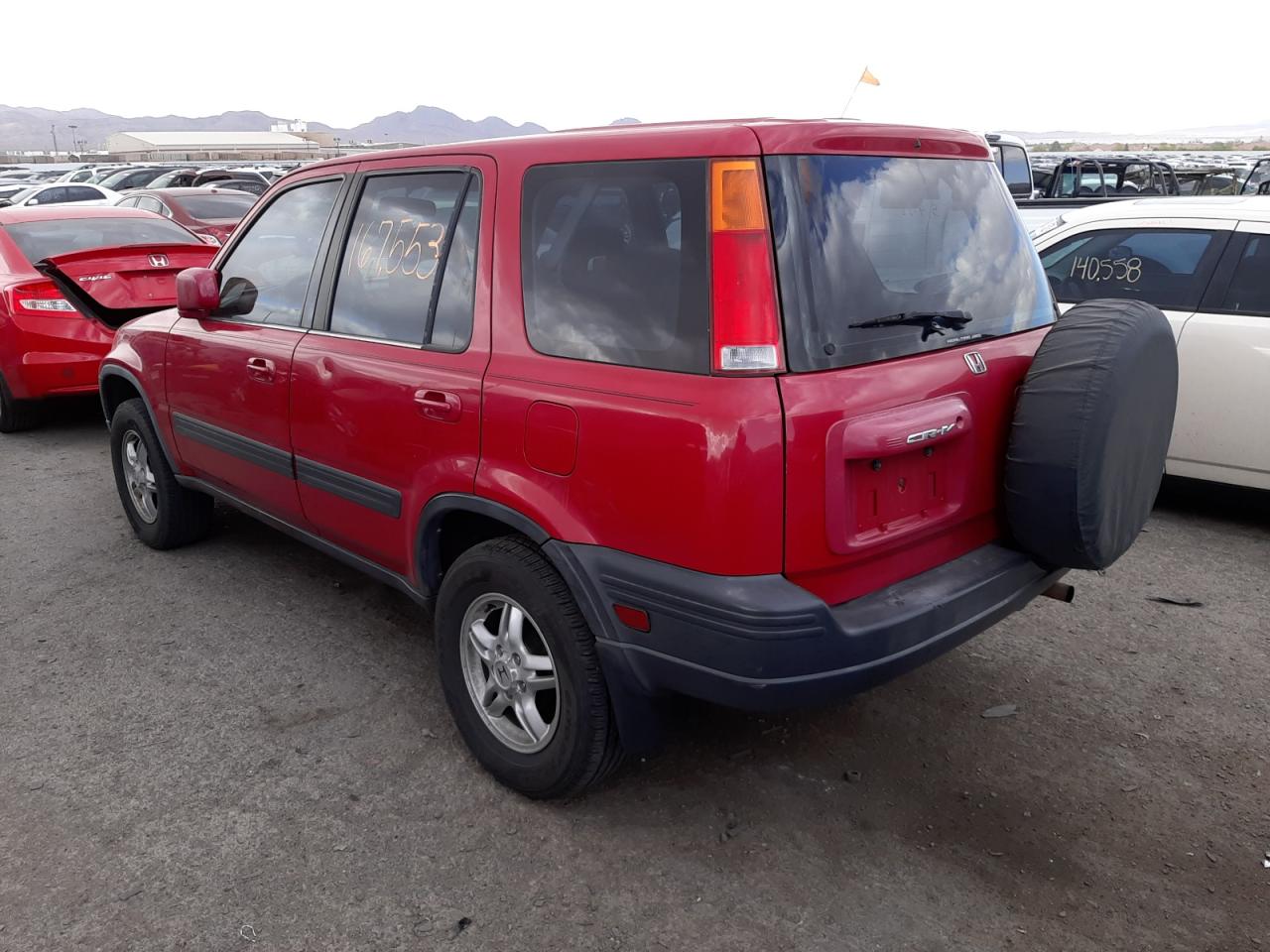 Photo 3 from auction – 1999 HONDA CR-V EX with VIN JHLRD1865XC038880