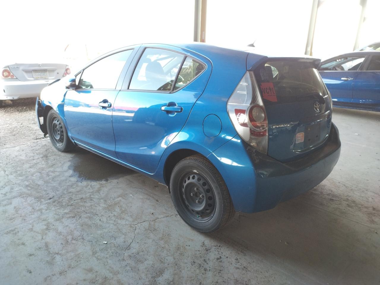 Photo 3 from auction – 2014 TOYOTA PRIUS C with VIN JTDKDTB31E1066709