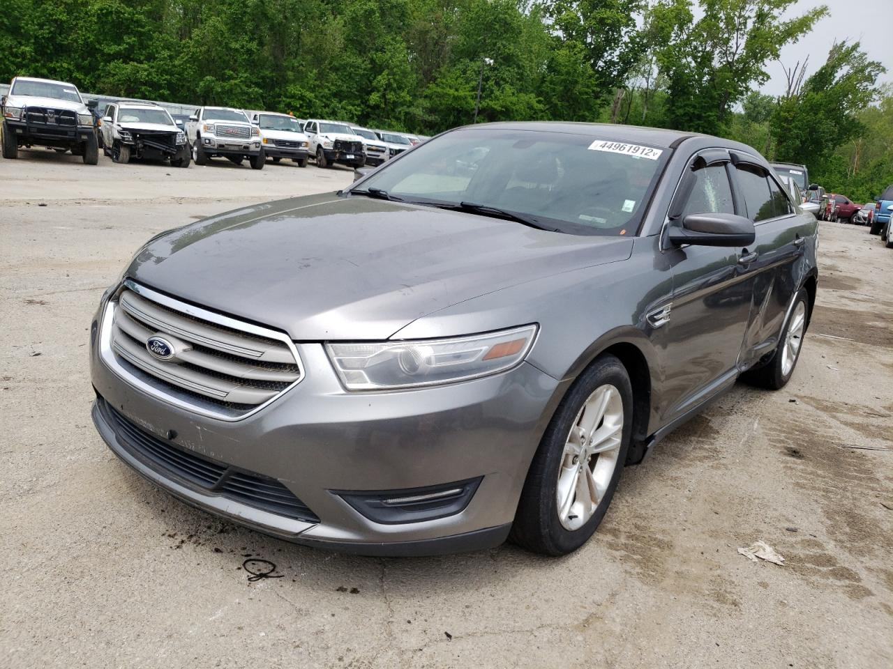 Photo 2 from auction – 2014 FORD TAURUS SEL with VIN 1FAHP2H82EG144982