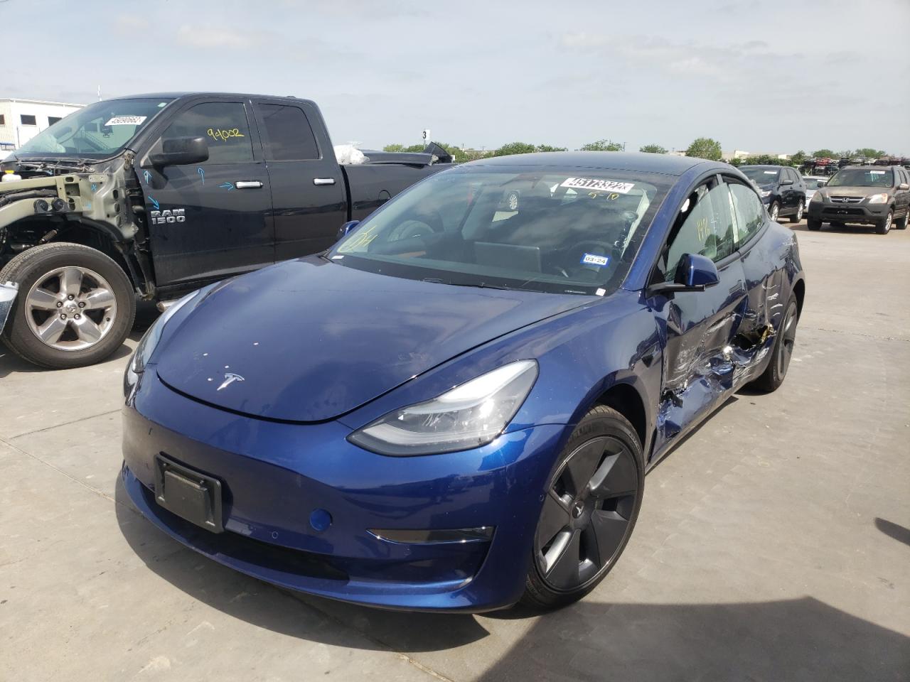 Photo 2 from auction – 2022 TESLA MODEL 3 with VIN 5YJ3E1EB5NF191535