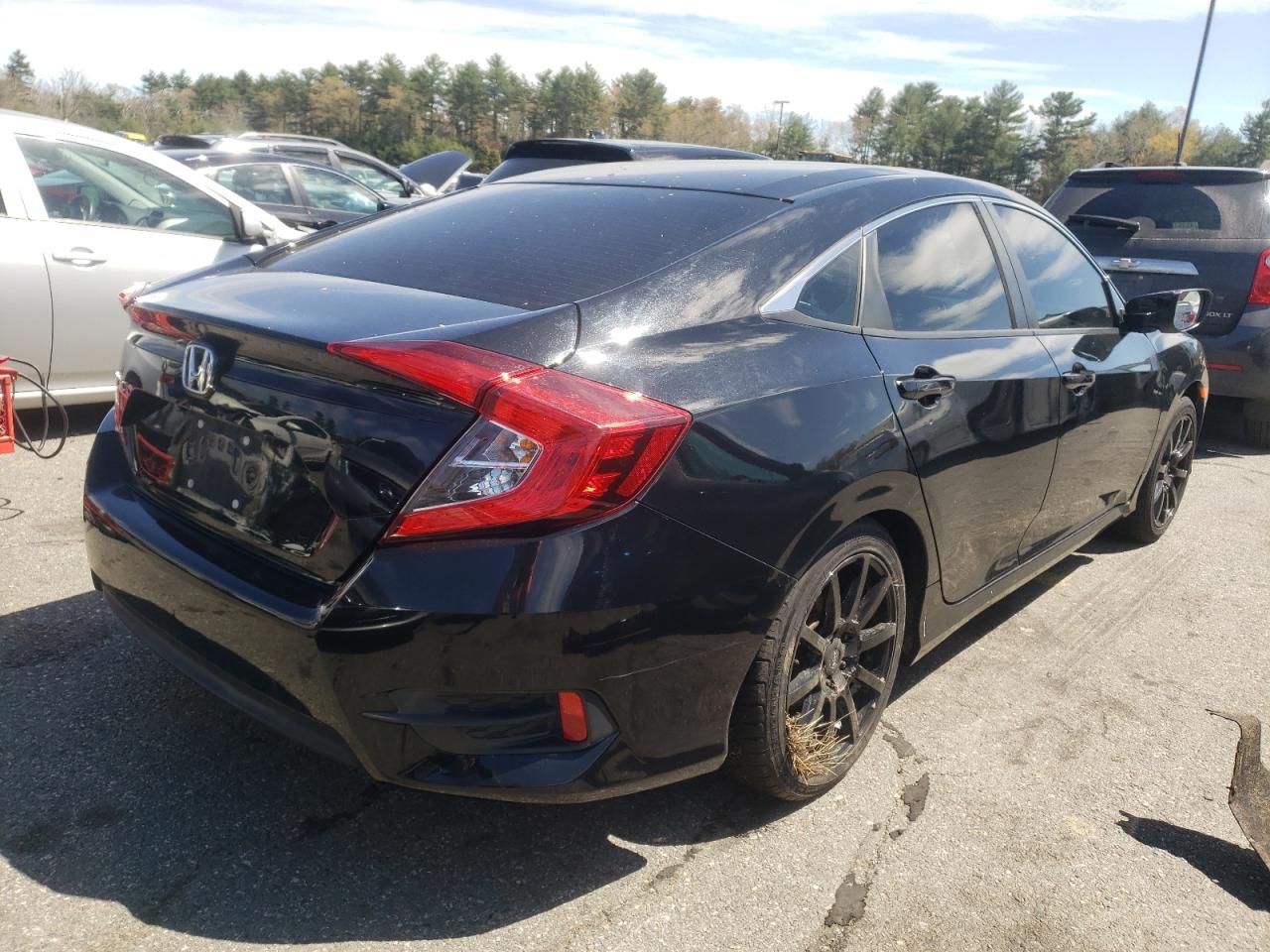 Photo 16 from auction – 2017 HONDA CIVIC LX with VIN 19XFC2F56HE206183
