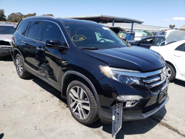 HONDA PILOT ELIT 2017 with VIN 5FNYF6H09HB068822 - Photo from auction