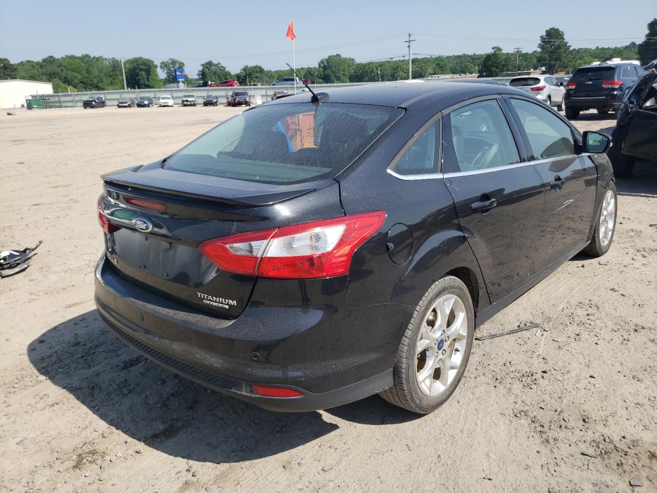 Photo 4 from auction – 2014 FORD FOCUS TITA with VIN 1FADP3J27EL450299
