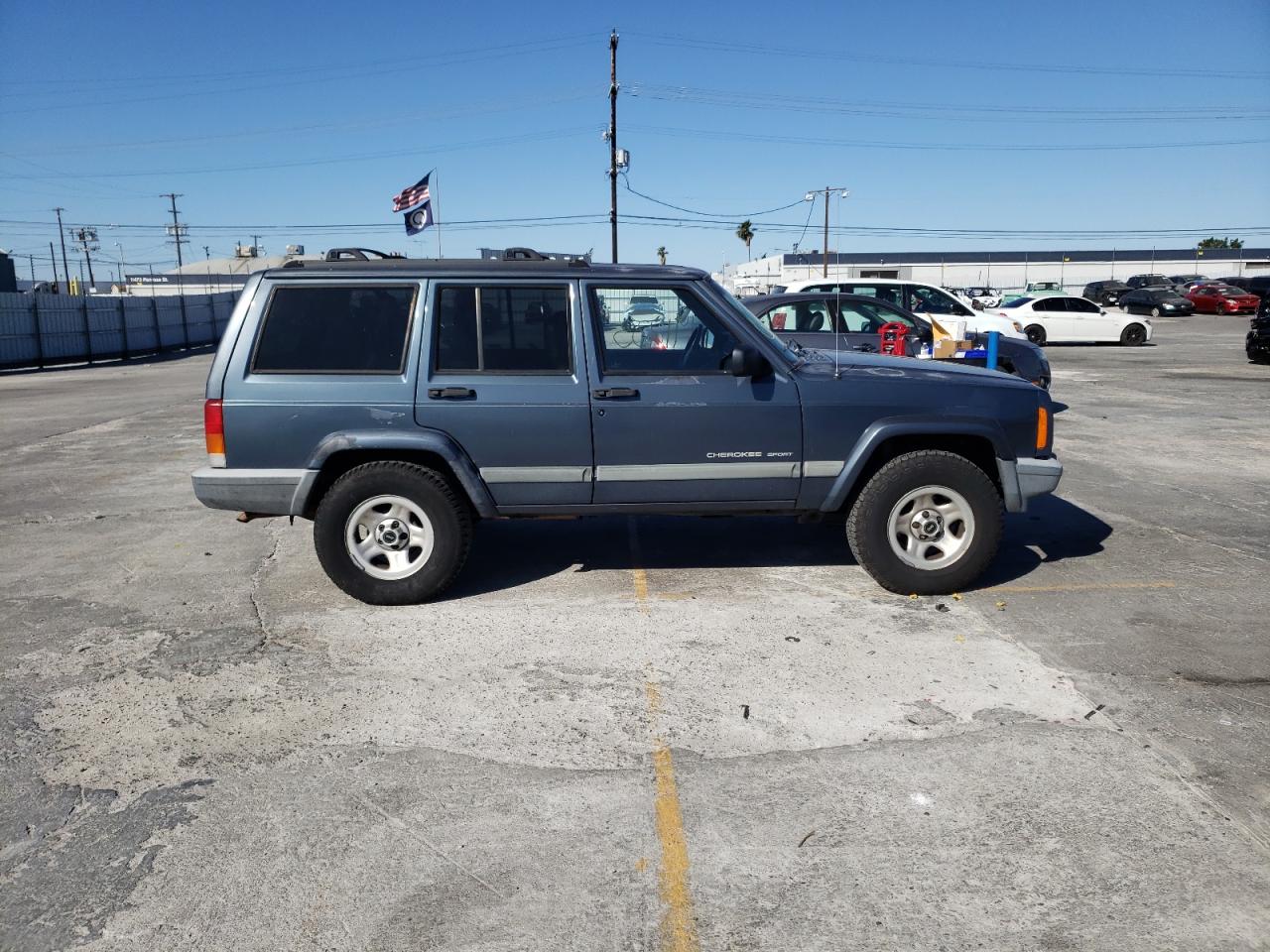 Photo 9 from auction – 2001 JEEP CHEROKEE S with VIN 1J4FT48SX1L531506