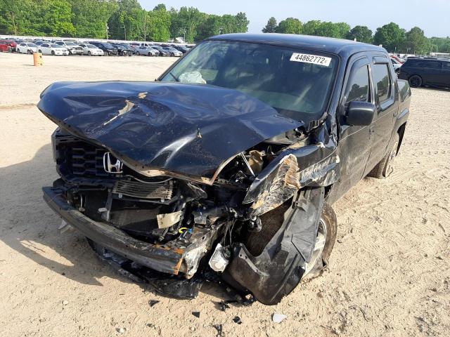 Photo 2 from auction – 2014 HONDA RIDGELINE with VIN 5FPYK1F78EB001663