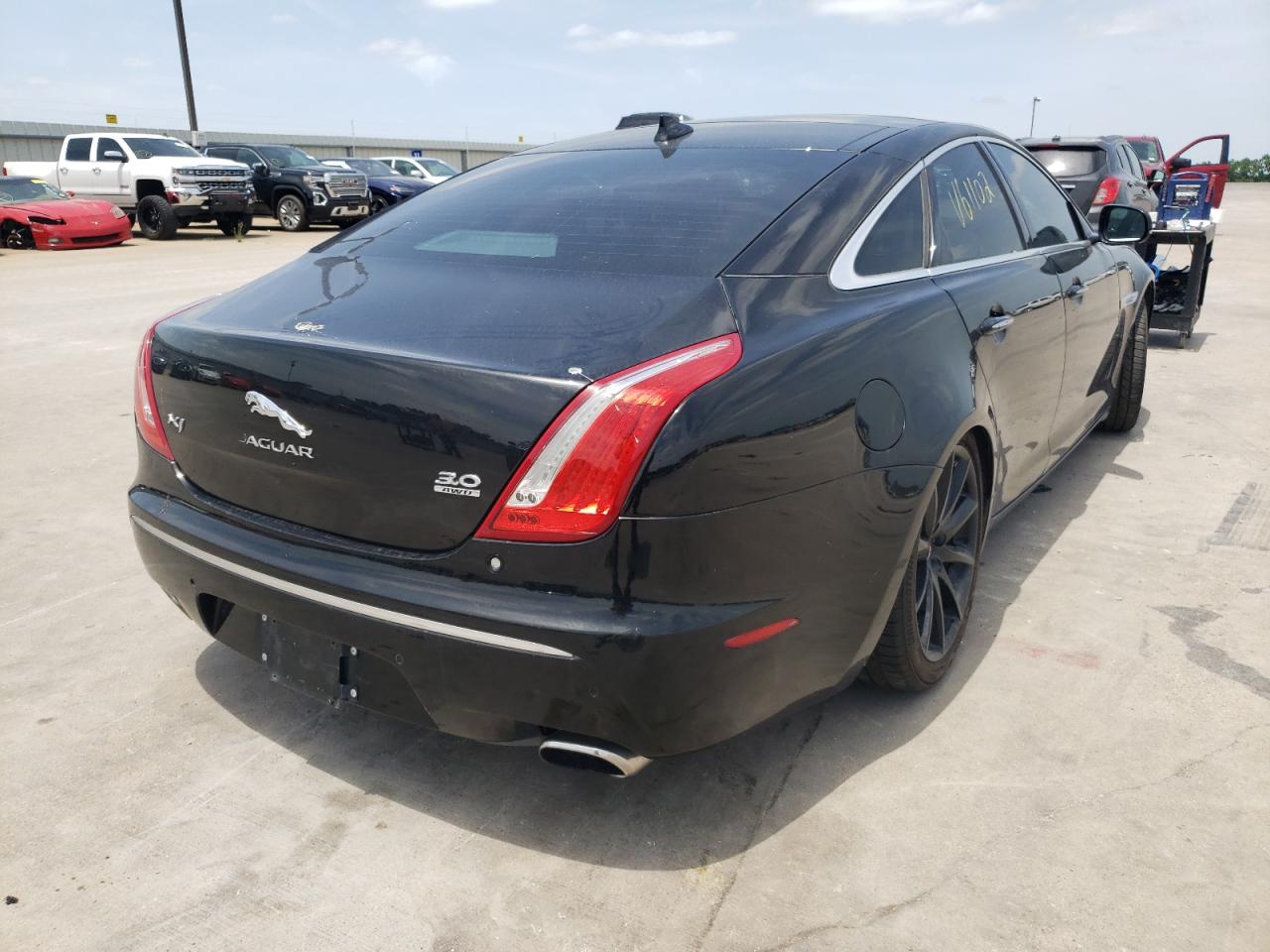 Photo 4 from auction – 2014 JAGUAR XJ with VIN SAJWJ1CD8E8V61102
