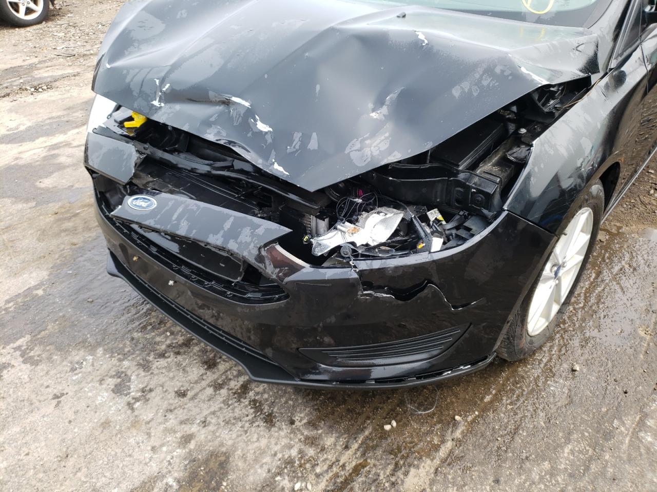 Photo 9 from auction – 2015 FORD FOCUS SE with VIN 1FADP3F21FL247502